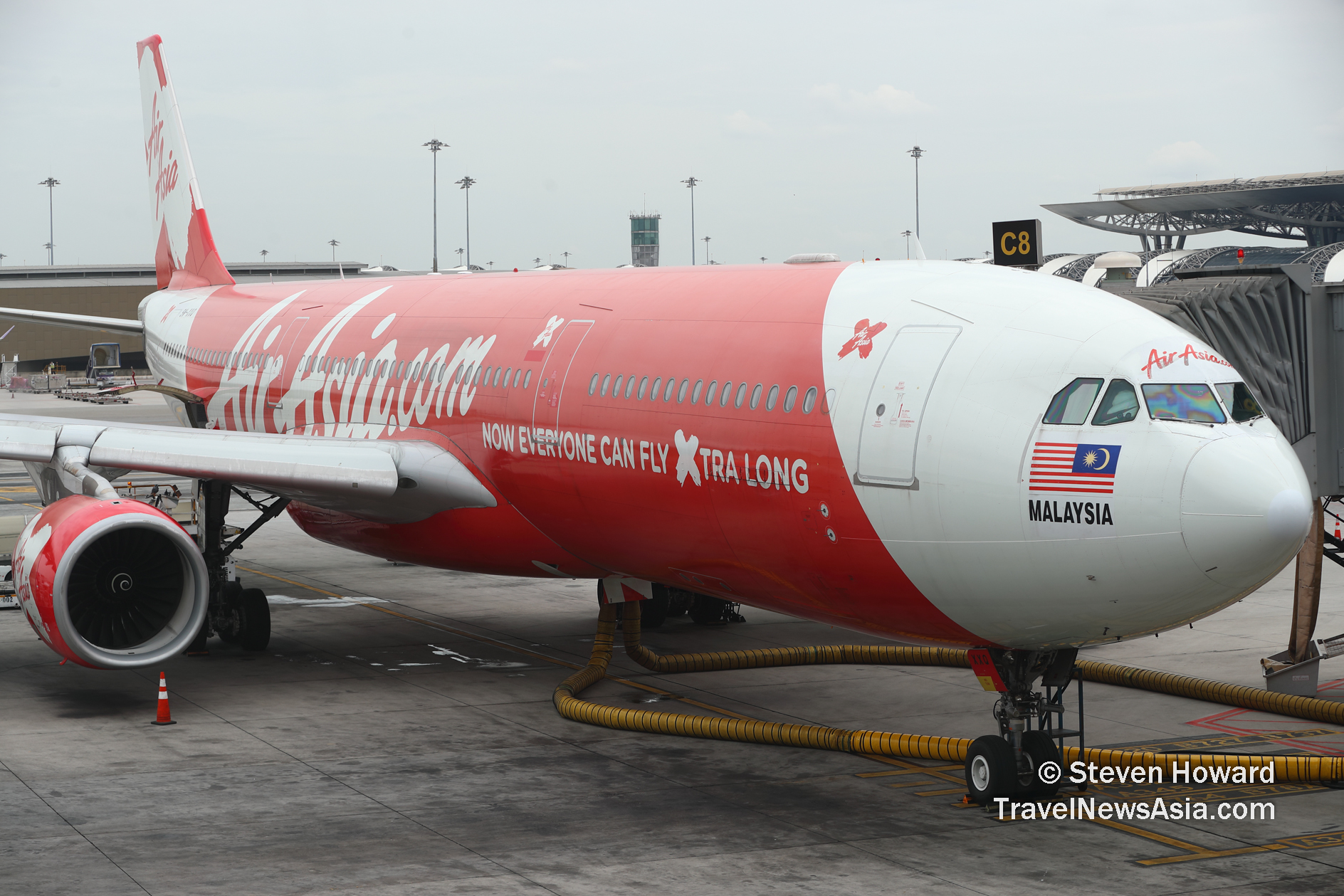 AirAsia X A330 reg: 9M-XXQ. Picture by Steven Howard of TravelNewsAsia.com Click to enlarge.