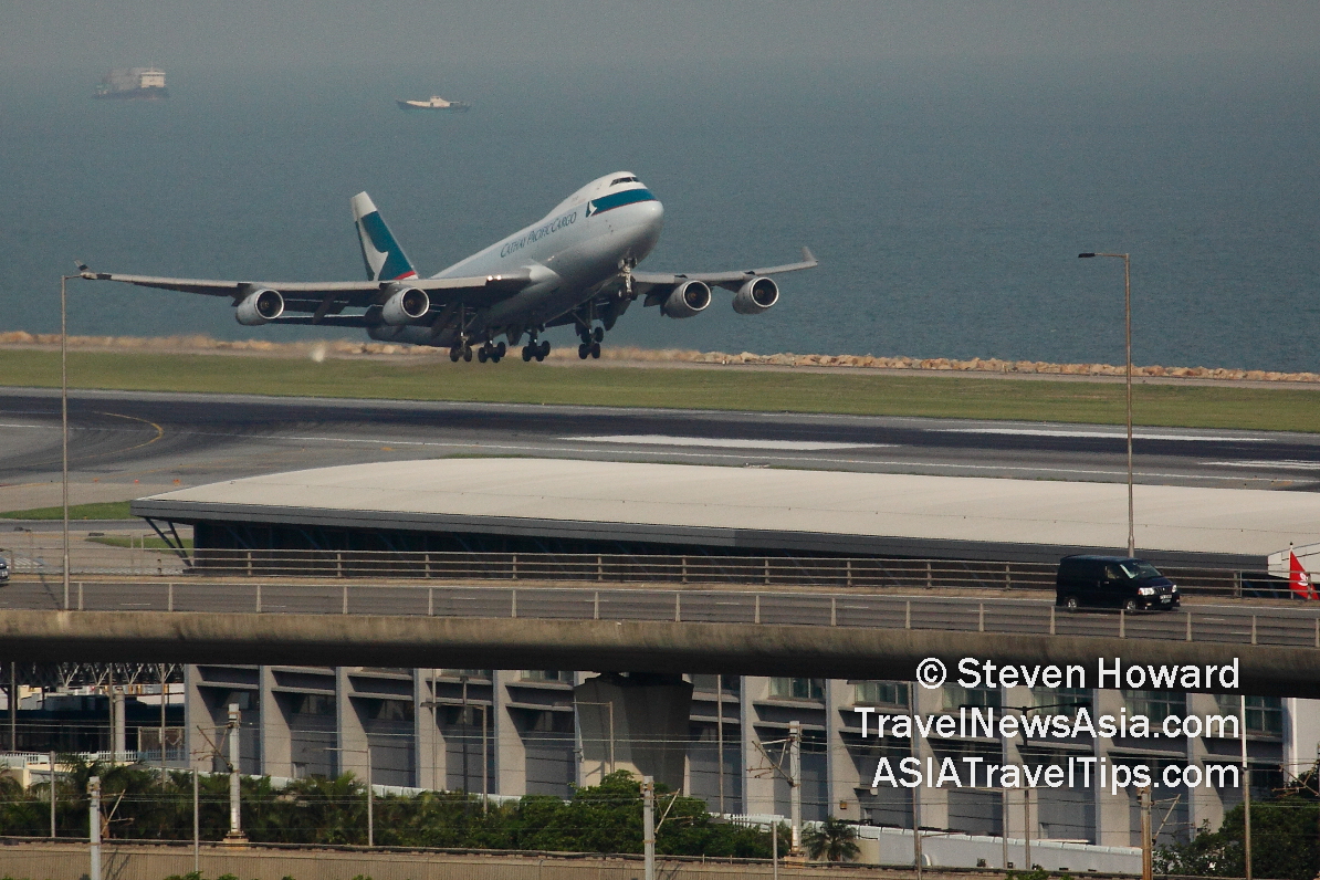 Cathay Pacific Cargo Boeing 747F taking of from Hong Kong Airport. Picture by Steven Howard of TravelNewsAsia.com Click to enlarge.