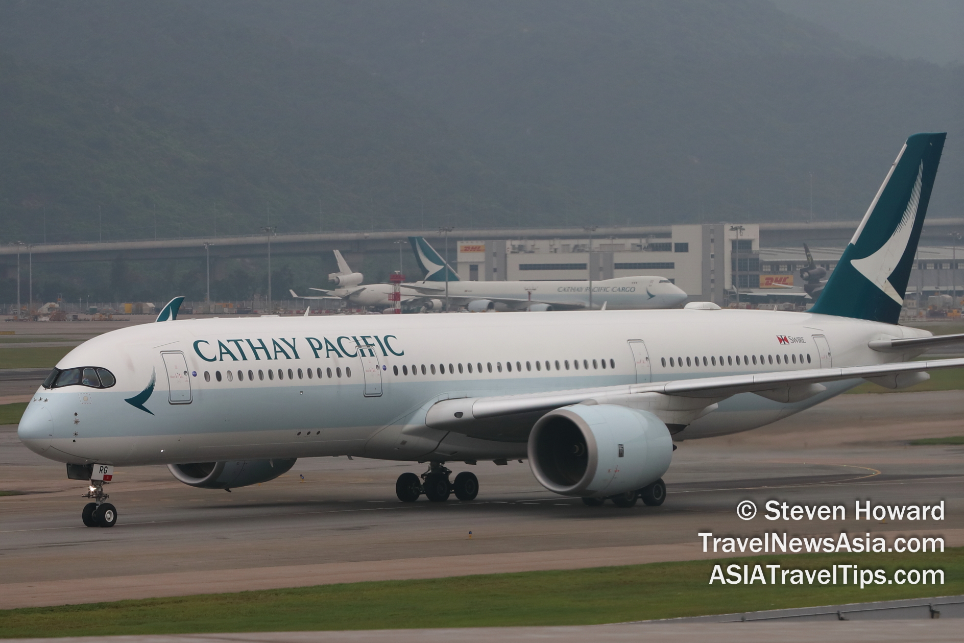 Cathay Pacific A350 and B747F at HKG. Picture by Steven Howard of TravelNewsAsia.com Click to enlarge.